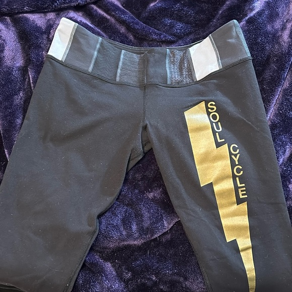 lululemon athletica Pants - Lululemon Soul Cycle Black Legging W/ gold lightning bolt Size 10